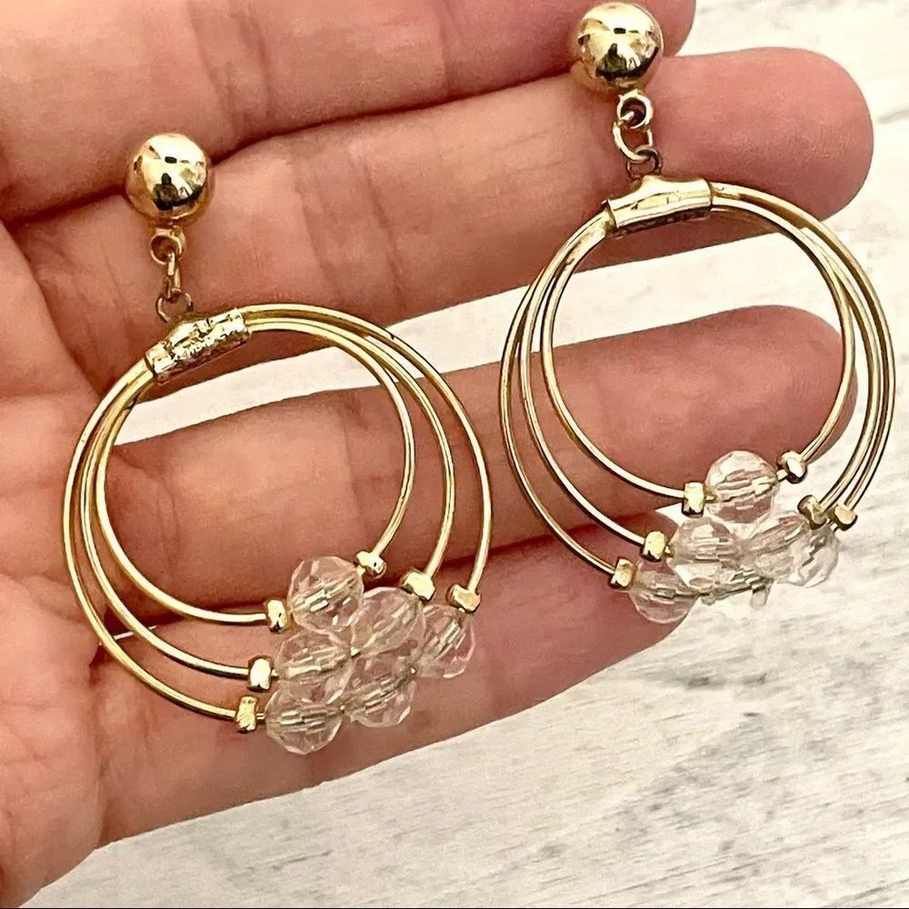 Gold tone clear bead triple circle post dangle earrings
